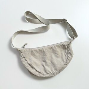 Uniqlo Adjustable Crossbody Crescent Bag